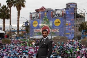 Naqvi Injury Law showed its support for underprivileged Las Vegas families with its fourth annual sponsorship of the 98.5 KLUC Toy Drive
