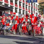 The 12th annual Las Vegas Great Santa Run over an estimated 8,000 adults, children and pets clad in Santa suits to Downtown Las Vegas