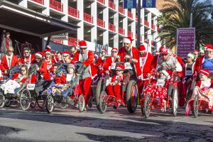The 12th annual Las Vegas Great Santa Run over an estimated 8,000 adults, children and pets clad in Santa suits to Downtown Las Vegas