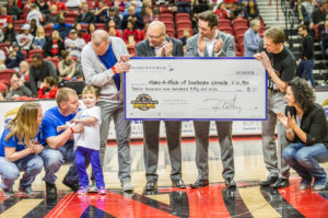 On Wednesday, Feb. 28, 2018, Nevada State Bank presented a check for $12,950 to Make-A-Wish Southern Nevada. The check was presented during halftime at the final home game for the UNLV Runnin’ Rebels.