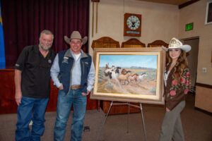 Artist Chris Lacey, 2022 Reno Rodeo President Josh Iveson and 2022 Miss Reno Rodeo Kaili Hill. Credit Fred Cornelius-1ea56ff3