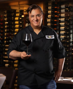 Giancarlo 1 with wine glass-5be9e69b